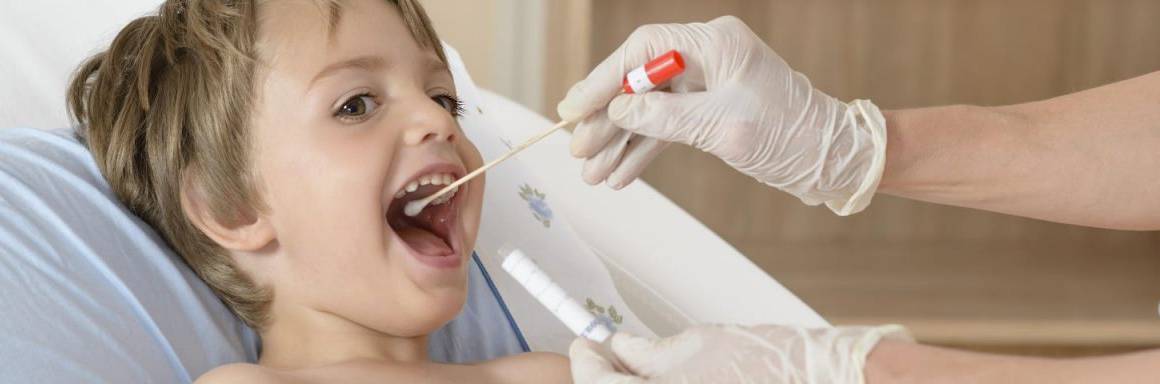 A kid under Flu Testing