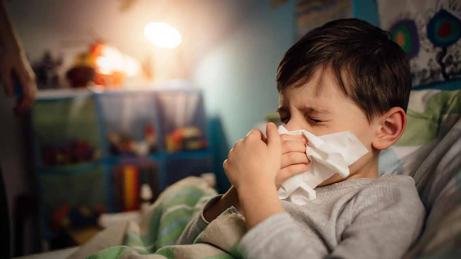 A kid with the disease influenza 